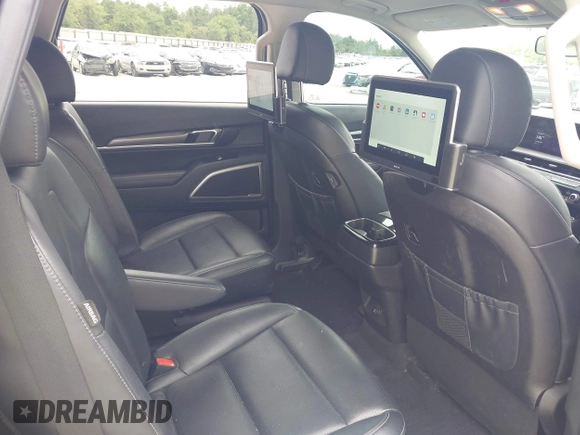 2023 Kia Telluride S with VIN 5XYP64GC0PG386895, listed as a IAAI auction lot 42365625 with 41,588 mi miles and . Bid and sale history available at DreamBid. Image 8.