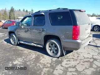2013 GMC Yukon SLE with VIN 1GKS2AE03DR354179, listed as a IAAI auction lot 41612114 with 150,851 mi miles. Bid and sale history available at carsss.com. Image 3.