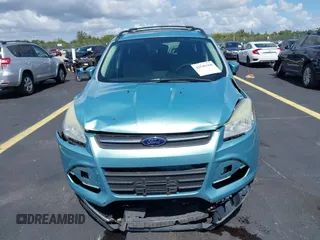 2013 Ford Escape SE with VIN 1FMCU9GX0DUC75662, listed as a IAAI auction lot 42549360 with 156,666 mi miles and . Bid and sale history available at DreamBid. Image 6.