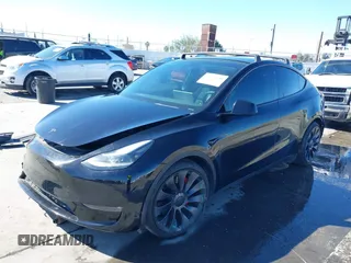 2021 Tesla Model Y Performance with VIN 5YJYGDEF9MF251738, listed as a IAAI auction lot 41708950 with 61,248 mi miles and . Bid and sale history available at DreamBid. Image 2.