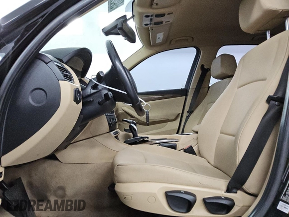 2014 BMW X1 sDrive28i with VIN WBAVM1C58EVW50919, listed as a Copart auction lot 49608985 with 219,971 mi miles and Clean Title. Bid and sale history available at carsss.com. Image 7.