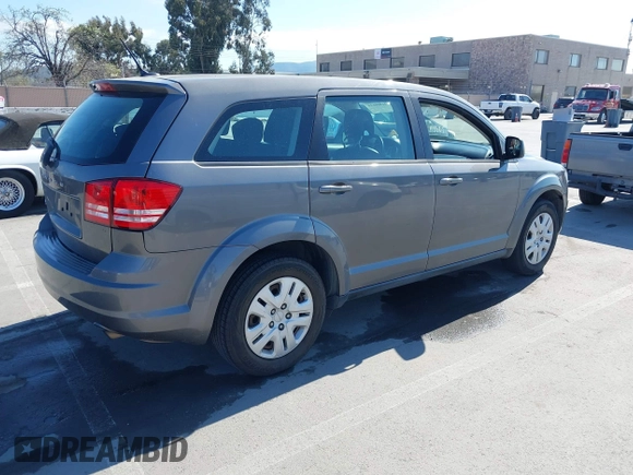 2013 Dodge Journey SE with VIN 3C4PDCAB7DT730744, listed as a IAAI auction lot 41900114 with 186,086 mi miles and . Bid and sale history available at DreamBid. Image 4.