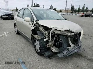 2009 Nissan Versa S with VIN 3N1BC11E79L433933, listed as a Copart auction lot 54953675 with 196,785 mi miles and Salvage Title. Bid and sale history available at DreamBid. Image 14.