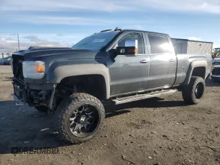 2017 GMC Sierra 2500HD Denali with VIN 1GT12UEY2HF172852, listed as a Copart auction lot 48895635 with 230,977 mi miles and Salvage Title. Bid and sale history available at carsss.com. Image 1.