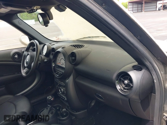 2014 MINI Countryman S with VIN WMWZC3C59EWP25041, listed as a IAAI auction lot 42085698 with 109,320 mi miles and . Bid and sale history available at DreamBid. Image 5.