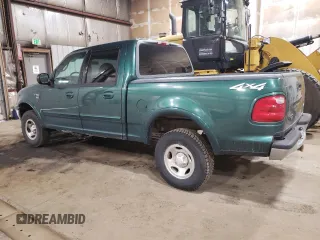2001 Ford F-150 XLT with VIN 1FTRW08W41KD98737, listed as a Copart auction lot 64695065 with 179,158 mi miles and Clean title. Bid and sale history available at DreamBid. Image 2.