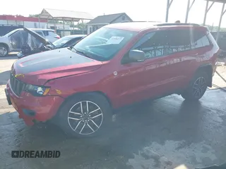 2021 Jeep Grand Cherokee Trailhawk with VIN 1C4RJFLG8MC549403, listed as a IAAI auction lot 42538177 with 33,124 mi miles and . Bid and sale history available at DreamBid. Image 2.