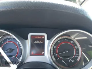 2015 Dodge Journey SE z VIN 3C4PDCAB5FT739266, wystawiony jako IAAI lot #41725086 z przebiegiem 134 109 mil mil oraz . Historia ofert i sprzedaży dostępna na DreamBid. Obrazek 7.