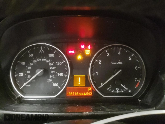 2011 BMW 1 Series 128i with VIN WBAUL7C52BVM80814, listed as a Copart auction lot 45150975 with 186,716 mi miles and Salvage title. Bid and sale history available at DreamBid. Image 9.