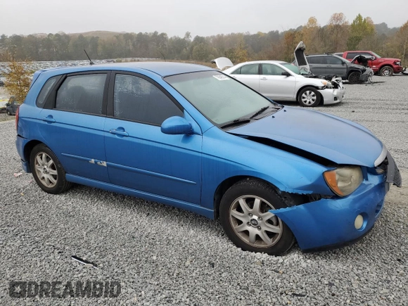 2005 Kia Spectra with VIN KNAFE161955108612, listed as a Copart auction lot 79648514 with 156,963 mi miles and Salvage Title. Bid and sale history available at carsss.com. Image 4.