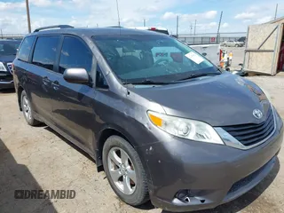 2013 Toyota Sienna LE AAS with VIN 5TDKK3DC1DS322738, listed as a IAAI auction lot 42459612 with 201,566 mi miles and . Bid and sale history available at DreamBid. Image 1.