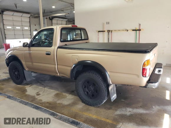 1998 Toyota Tacoma with VIN 4TAPM62N3WZ121359, listed as a Copart auction lot 63473485 with 133,472 mi miles and Salvage title. Bid and sale history available at DreamBid. Image 2.