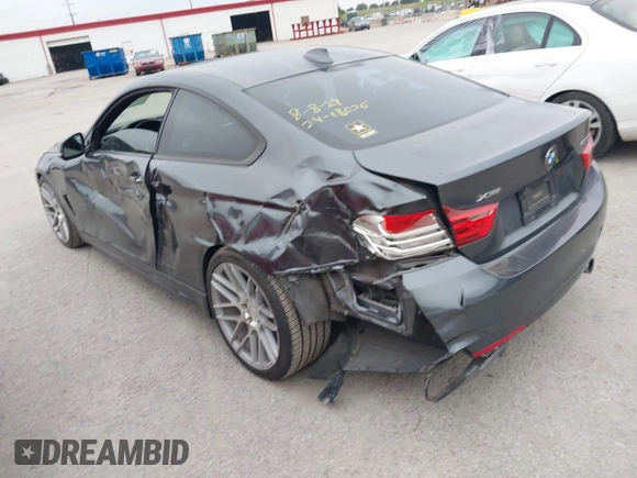 2014 BMW 4 Series 435i xDrive with VIN WBA3R5C53EK188805, listed as a IAAI auction lot 42365884 with 148,294 mi miles and . Bid and sale history available at DreamBid. Image 3.
