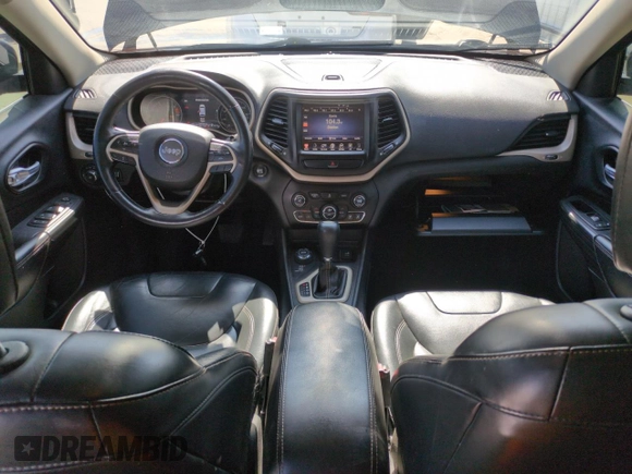 2016 Jeep Cherokee Limited with VIN 1C4PJMDB9GW151425, listed as a Copart auction lot 51323675 with 141,499 mi miles and Salvage Title. Bid and sale history available at DreamBid. Image 8.