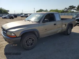 2002 Dodge Dakota with VIN 1B7GL12X02S545788, listed as a Copart auction lot 69987164 with 247,912 mi miles and Salvage Title. Bid and sale history available at carsss.com. Image 1.