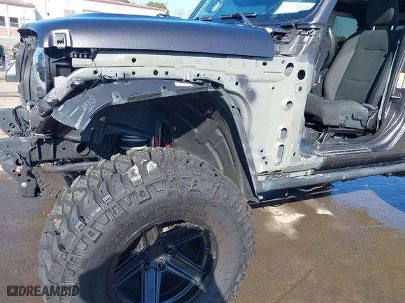 2019 Jeep Wrangler Unlimited Sport S with VIN 1C4HJXDG2KW612913, listed as a IAAI auction lot 41519311 with 104,583 mi miles. Bid and sale history available at carsss.com. Image 19.
