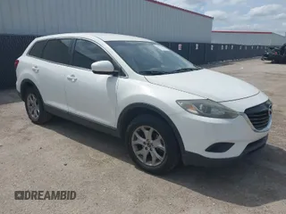 2015 Mazda CX-9 Sport with VIN JM3TB2BV7F0452071, listed as a IAAI auction lot 41895074 with 122,101 mi miles and . Bid and sale history available at carsss.com. Image 1.