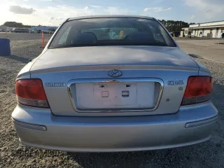 2005 Hyundai Sonata GLS with VIN KMHWF35H95A116657, listed as a Copart auction lot 77614154 with 101,164 mi miles and Salvage Title. Bid and sale history available at carsss.com. Image 6.