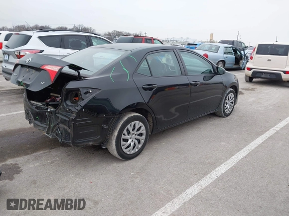 2019 Toyota Corolla L with VIN 5YFBURHE5KP945925, listed as a IAAI auction lot 41493079 with 96,849 mi miles and . Bid and sale history available at carsss.com. Image 4.