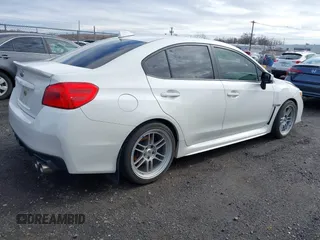 2016 Subaru WRX Premium with VIN JF1VA1E60G8803396, listed as a IAAI auction lot 41628626 with 51,512 mi miles. Bid and sale history available at carsss.com. Image 4.