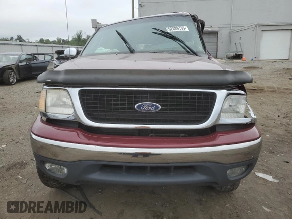 1999 Ford Expedition XLT with VIN 1FMPU18L6XLA61106, listed as a Copart auction lot 62688735 with 105,551 mi miles and Salvage title. Bid and sale history available at DreamBid. Image 5.