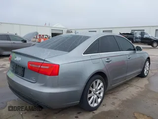 2013 Audi A6 3.0T Premium Plus with VIN WAUGGAFC4DN089255, listed as a IAAI auction lot 41509432 with 134,223 mi miles. Bid and sale history available at carsss.com. Image 4.
