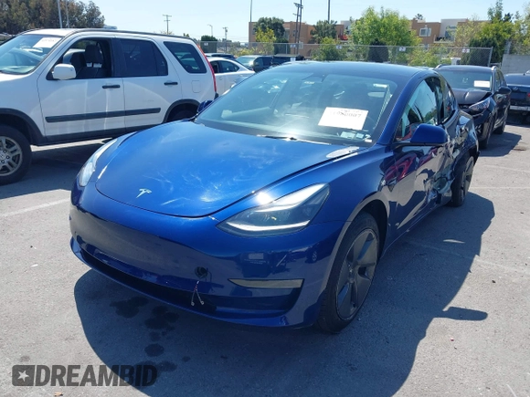 2023 Tesla Model 3 with VIN 5YJ3E1EA1PF431190, listed as a IAAI auction lot 41980007 with 26,164 mi miles and . Bid and sale history available at DreamBid. Image 20.