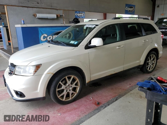 2013 Dodge Journey SXT with VIN 3C4PDDBG1DT521452, listed as a Copart auction lot 62660785 with 177,945 mi miles and Salvage title. Bid and sale history available at DreamBid. Image 1.