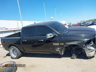 2018 Ram 1500 Lone Star Silver with VIN 1C6RR6LT1JS200095, listed as a IAAI auction lot 41842896 with 99,406 mi miles and . Bid and sale history available at DreamBid. Image 14.
