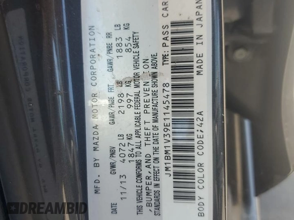 2014 Mazda 3 S Touring with VIN JM1BM1V39E1145478, listed as a Copart auction lot 57860645 with 55,322 mi miles and Salvage title. Bid and sale history available at DreamBid. Image 12.