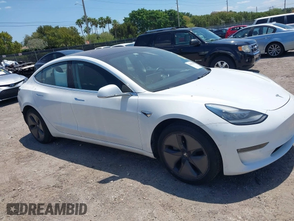 2018 Tesla Model 3 Long Range Battery with VIN 5YJ3E1EAXJF027179, listed as a IAAI auction lot 42059918 with 43,566 mi miles. Bid and sale history available at carsss.com. Image 1.