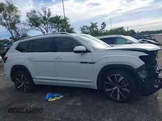 2024 Volkswagen Atlas SEL Premium R-Line z VIN 1V2FR2CA3RC528268, wystawiony jako IAAI lot #40248966 z przebiegiem 13 401 mil mil oraz . Historia ofert i sprzedaży dostępna na DreamBid. Obrazek 13.