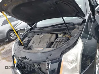 2013 Cadillac SRX Performance Collection with VIN 3GYFNHE33DS527519, listed as a IAAI auction lot 41652822 with 201,580 mi miles. Bid and sale history available at carsss.com. Image 10.