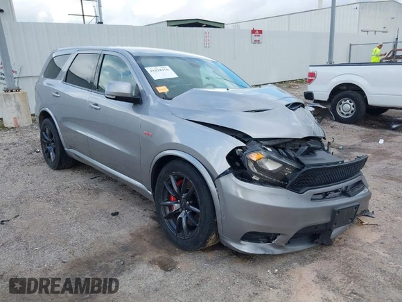 2018 Dodge Durango SRT with VIN 1C4SDJGJ5JC256006, listed as a IAAI auction lot 41038356 with 71,385 mi miles and . Bid and sale history available at DreamBid. Image 1.