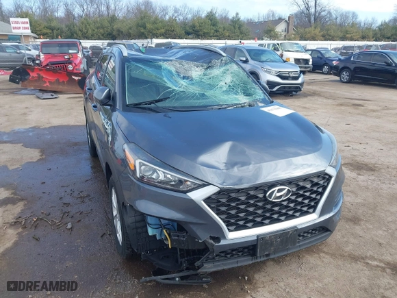 2019 Hyundai Tucson Value with VIN KM8J33A40KU999340, listed as a IAAI auction lot 41876380 with 52,752 mi miles. Bid and sale history available at carsss.com. Image 6.
