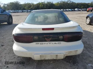 1998 Pontiac Firebird Firebird z VIN 2G2FS22K4W2216654, wystawiony jako Copart lot #87287814 z przebiegiem Nie podano mil oraz Czysty tytuł • Clean title. Historia ofert i sprzedaży dostępna na DreamBid. Obrazek 6.
