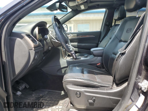 2016 Jeep Grand Cherokee Overland with VIN 1C4RJFCG9GC338165, listed as a Copart auction lot 54125815 with 102,302 mi miles and Salvage title. Bid and sale history available at DreamBid. Image 7.
