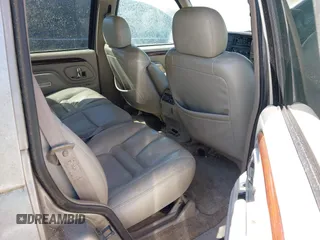 2000 Cadillac Escalade z VIN 1GYEK63R2YR209125, wystawiony jako IAAI lot #41854270 z przebiegiem 198 017 mil mil oraz . Historia ofert i sprzedaży dostępna na DreamBid. Obrazek 8.