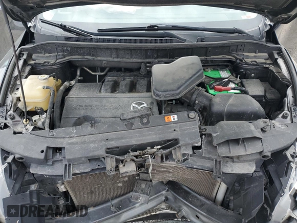 2014 Mazda CX-9 Touring with VIN JM3TB2CA7E0444918, listed as a Copart auction lot 57801165 with 116,638 mi miles and Salvage title. Bid and sale history available at DreamBid. Image 12.