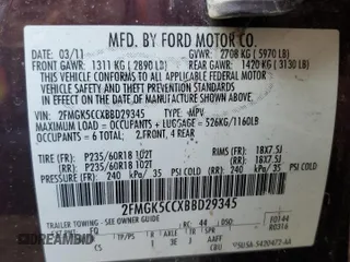 2011 Ford Flex SEL z VIN 2FMGK5CCXBBD29345, wystawiony jako Copart lot #47361145 z przebiegiem 150 531 mil mil oraz Szkoda całkowita • Salvage title. Historia ofert i sprzedaży dostępna na DreamBid. Obrazek 14.