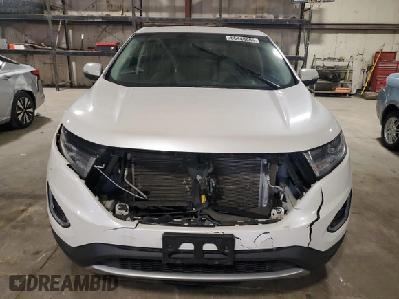 2015 Ford Edge Titanium z VIN 2FMTK3K91FBB08263, wystawiony jako Copart lot #55448405 z przebiegiem 135 788 mil mil oraz Szkoda całkowita • Salvage title. Historia ofert i sprzedaży dostępna na DreamBid. Obrazek 5.