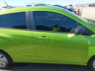 2016 Chevrolet Spark LS with VIN KL8CB6SAXGC580309, listed as a IAAI auction lot 41490002 with 51,631 mi miles. Bid and sale history available at carsss.com. Image 13.
