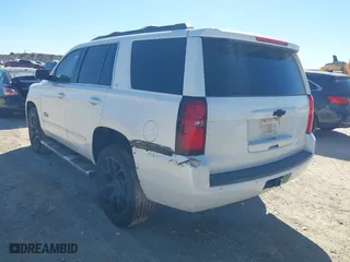 2018 Chevrolet Tahoe LT with VIN 1GNSCBKC8JR128476, listed as a IAAI auction lot 41447799 with 105,209 mi miles. Bid and sale history available at carsss.com. Image 3.
