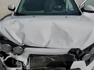2015 Chevrolet Sonic LT with VIN 1G1JC5SB7F4215988, listed as a Copart auction lot 84712374 with 0 mi miles and Salvage Title. Bid and sale history available at carsss.com. Image 12.