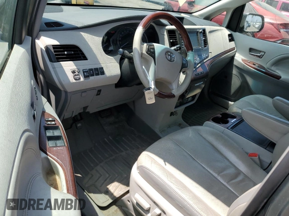 2012 Toyota Sienna XLE with VIN 5TDDK3DC1CS043460, listed as a Copart auction lot 64900495 with 190,187 mi miles and Clean title. Bid and sale history available at DreamBid. Image 8.