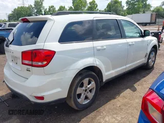 2012 Dodge Journey SXT with VIN 3C4PDCBG3CT387763, listed as a IAAI auction lot 42720016 with 190,692 mi miles and . Bid and sale history available at DreamBid. Image 4.