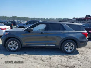 2020 Ford Explorer XLT with VIN 1FMSK7DH0LGB14180, listed as a IAAI auction lot 41671804 with 76,677 mi miles. Bid and sale history available at carsss.com. Image 14.