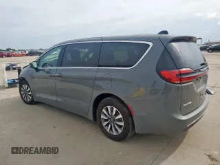 2023 Chrysler Pacifica Hybrid Touring L with VIN 2C4RC1L72PR614075, listed as a Copart auction lot 58586115 with 43,960 mi miles and Salvage title. Bid and sale history available at DreamBid. Image 2.
