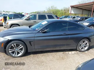 2015 BMW 4 Series 428i xDrive z VIN WBA3N5C55FK484938, wystawiony jako IAAI lot #41889907 z przebiegiem 100 439 mil mil oraz . Historia ofert i sprzedaży dostępna na DreamBid. Obrazek 14.