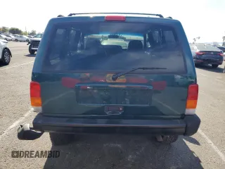 1997 Jeep Cherokee Sport with VIN 1J4FT68S4VL545385, listed as a Copart auction lot 49616325 with 239,798 mi miles and Salvage Title. Bid and sale history available at carsss.com. Image 6.